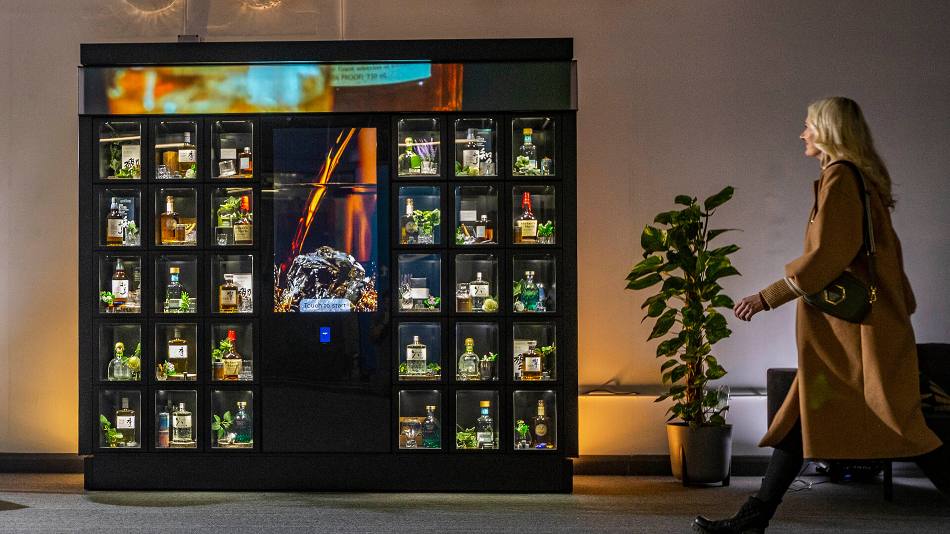 Shoppers at a Bright.Blue connected machine in venue