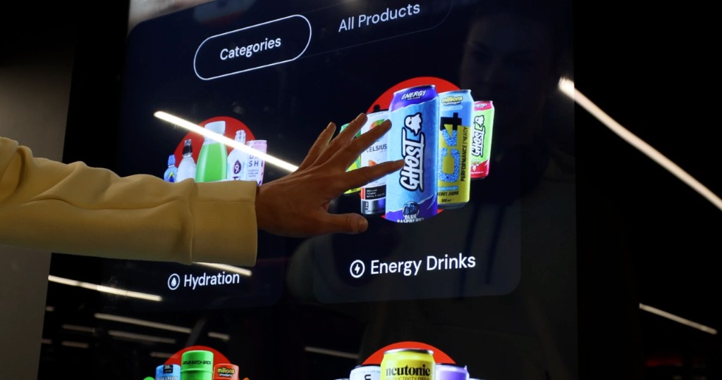 Hand selecting products on a Bright.Blue connected retail screen