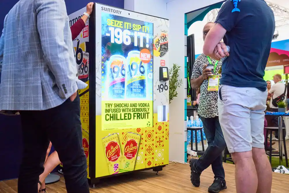 Branded Bright.Blue activation drawing a crowd on an event floor